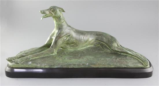 M. Fiot. A bronze model of a greyhound lying upon naturalistic base, width 23.5in. height 10.5in.